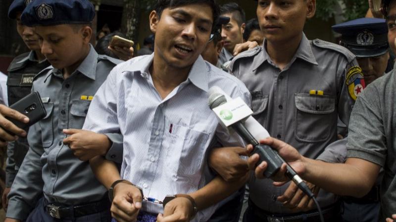 Myanmar condena jornalistas da Reuters a sete anos de prisão