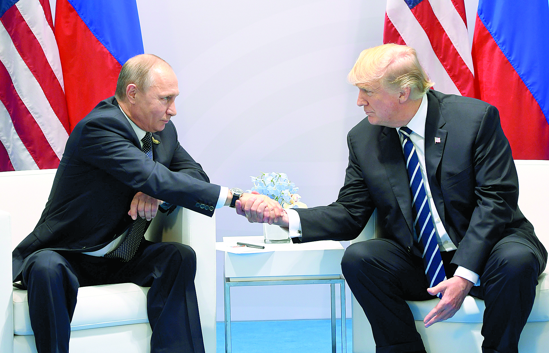 Trump e Putin encontram-se enfim e chegam a acordo sírio